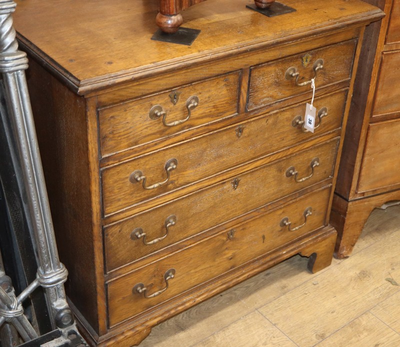 A small reproduction oak five drawer chest, W.83cm, D.48cm, H.82cm